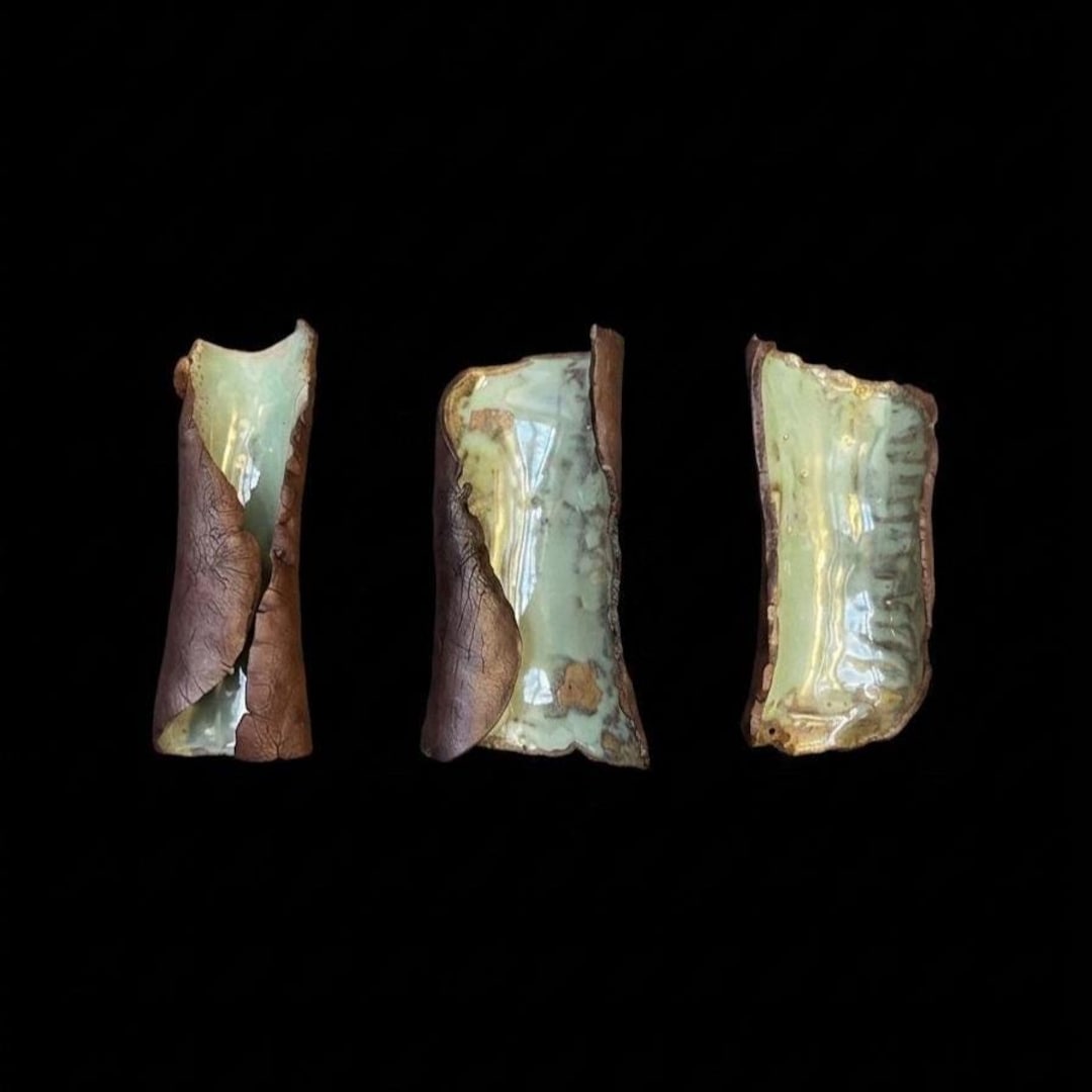 Fractured Tide, three-piece ceramic wall hanging in Brooklyn Red clay with seafoam crackle glaze